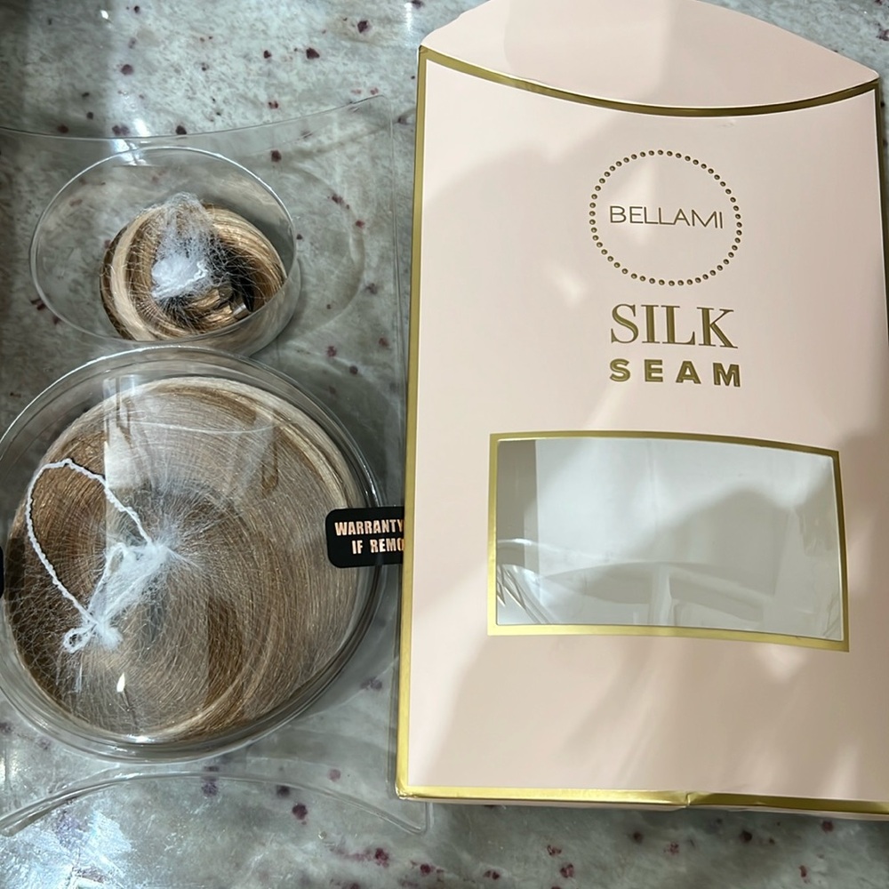 Never used, in original packaging. 22 inch silk seam extensions